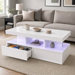 White coffee table with open shelf, two drawers, and purple LED underglow