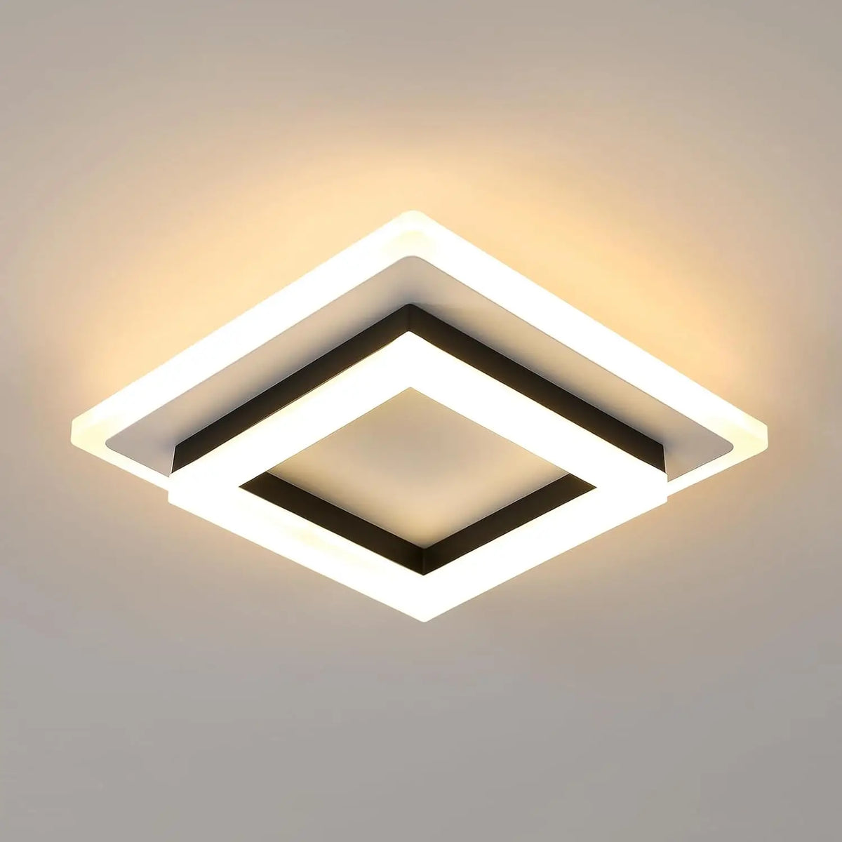 Square LED flush ceiling light with glowing white ring and black core