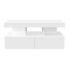 High-gloss white coffee table with two storage drawers and open middle shelf