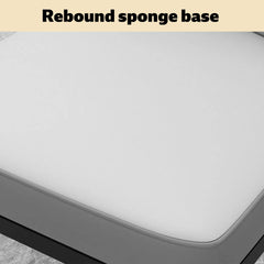 Light gray padded seat cushion edge on black chair frame