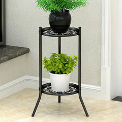 Black metal 2-tier plant pot stand with round shelves, potted plants on both levels