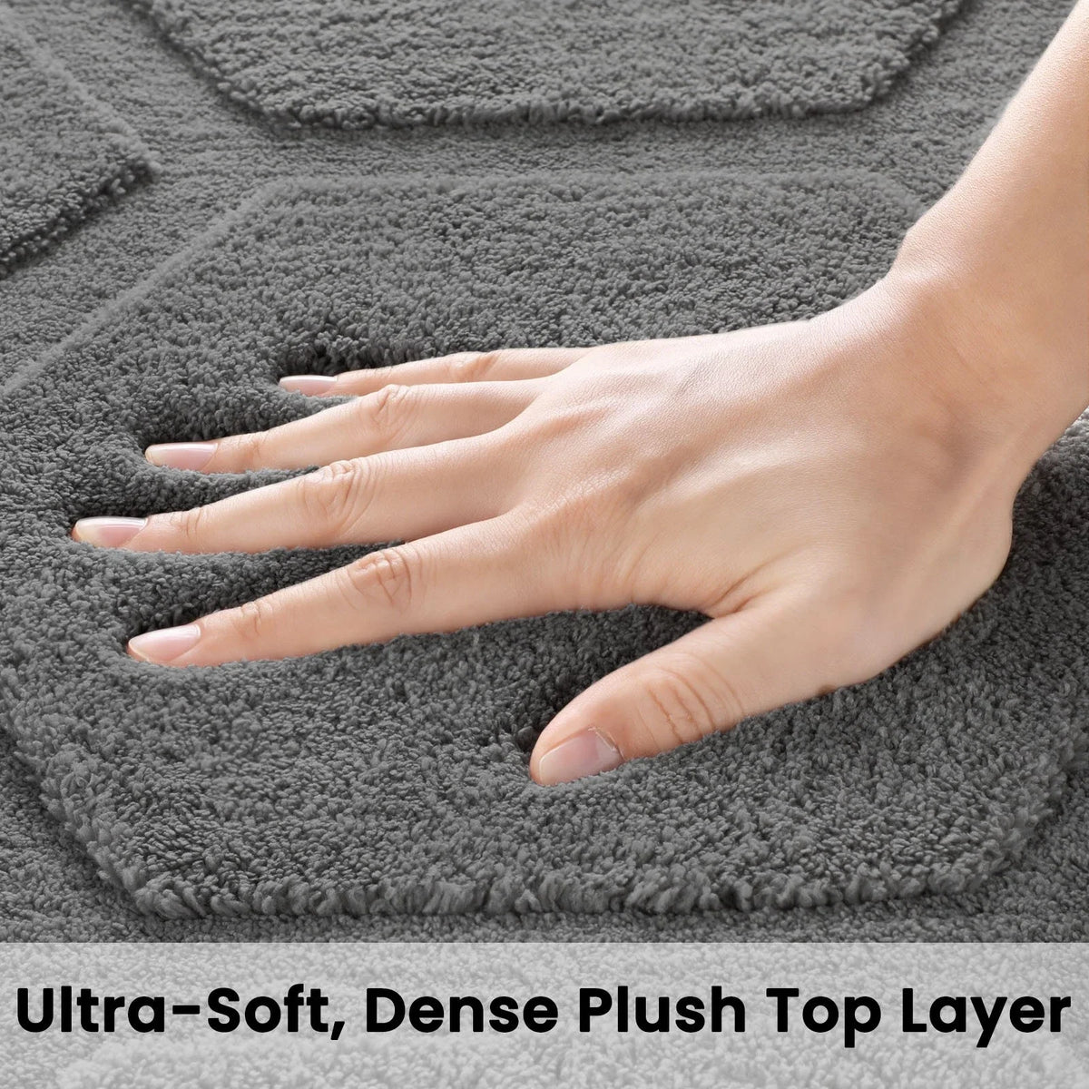 Gray plush shag area rug with dense pile texture, soft cushioned surface