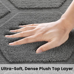 Gray plush shag area rug with dense pile texture, soft cushioned surface