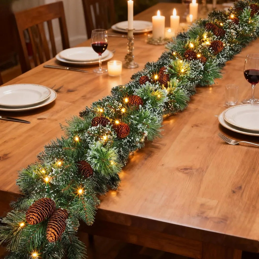 Dining table centerpiece with evergreen wreath garland lined with warm white lights