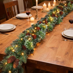 Dining table centerpiece with evergreen wreath garland lined with warm white lights