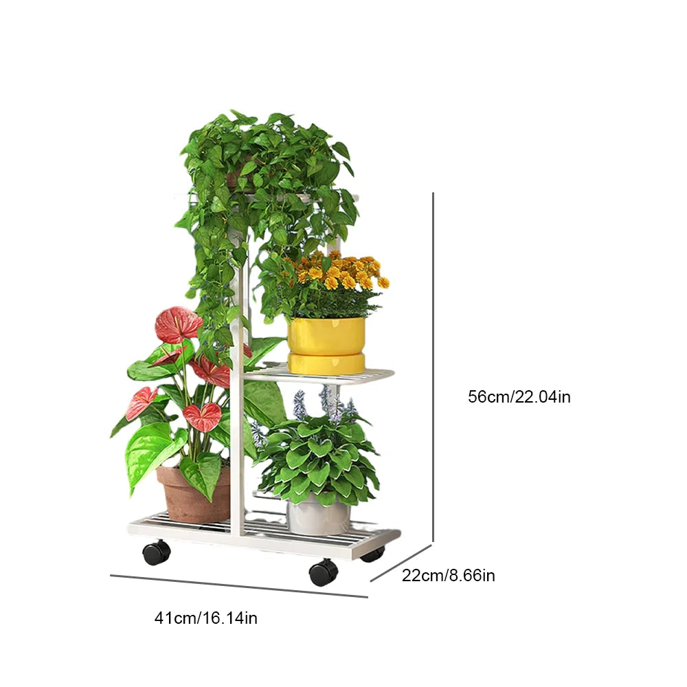 White 3-tier plant stand with wheels and three potted plants, yellow pot on middle shelf