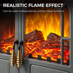 Close-up of grey electric fireplace stove showing bright orange LED flame effect through glass