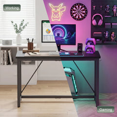 Black computer desk with wide tabletop and metal legs for gaming or work