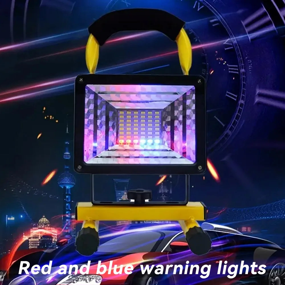 Portable LED flood light showing red and blue warning light glow on the panel