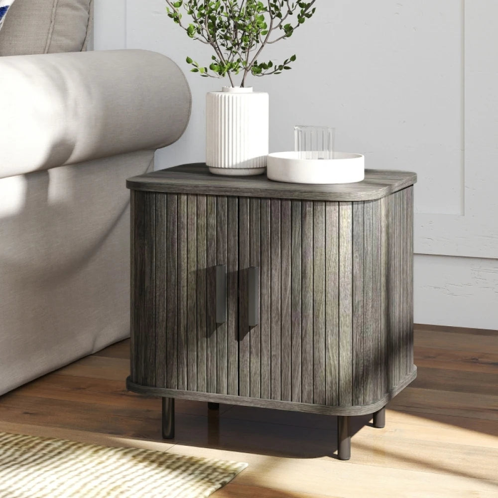 Grey bedside table with roller shutter sliding door and sturdy metal legs