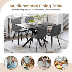 Rectangular extendable dining table with dark tabletop and black pedestal-style legs.