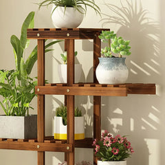 Brown wooden plant rack with multiple slatted levels and potted succulents