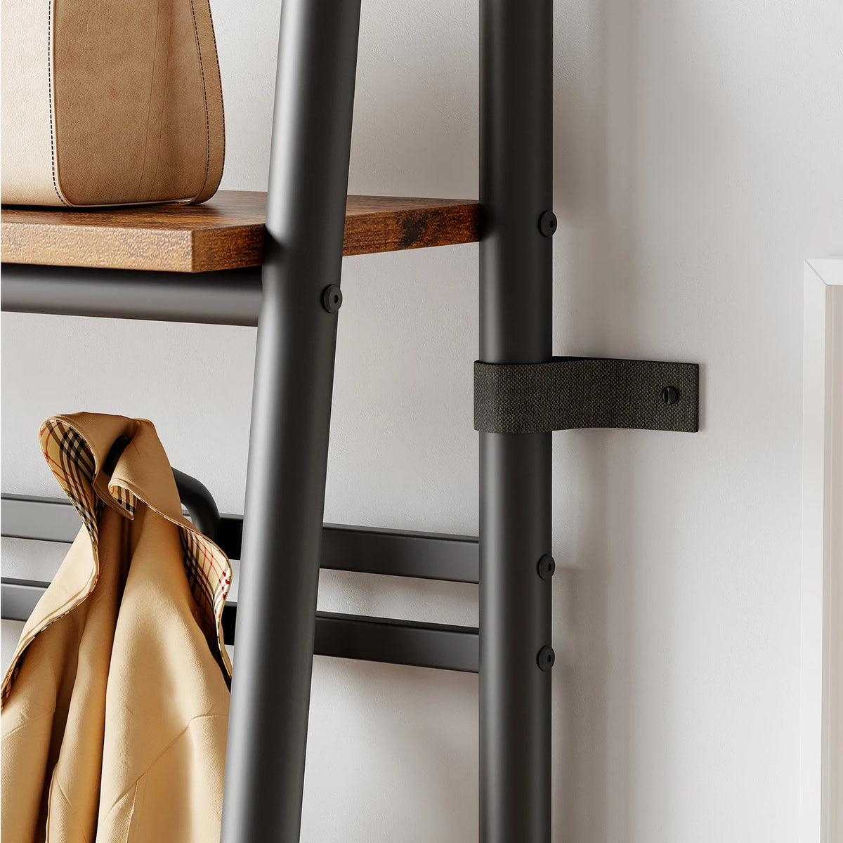 Black steel coat rack frame with layered shelves and hanging support panel