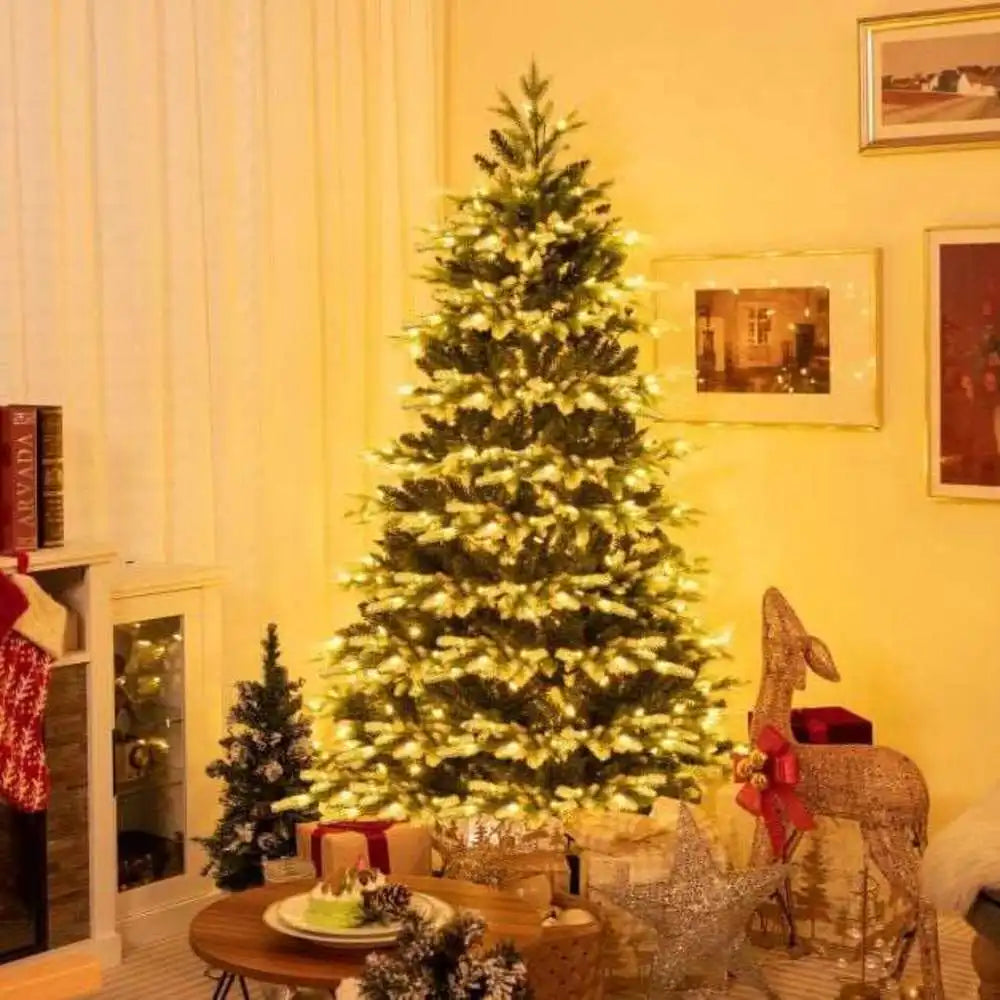Artificial hinged Christmas tree with full green branches and 180 cm height