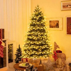 Artificial hinged Christmas tree with full green branches and 180 cm height