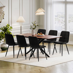 Rectangular extendable dining table with dark wood top and 6 upholstered black chairs