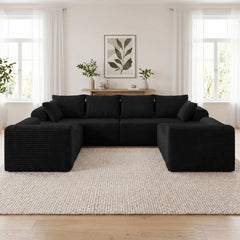 Black U-shaped modular corner sofa with deep seats and stacked back cushions