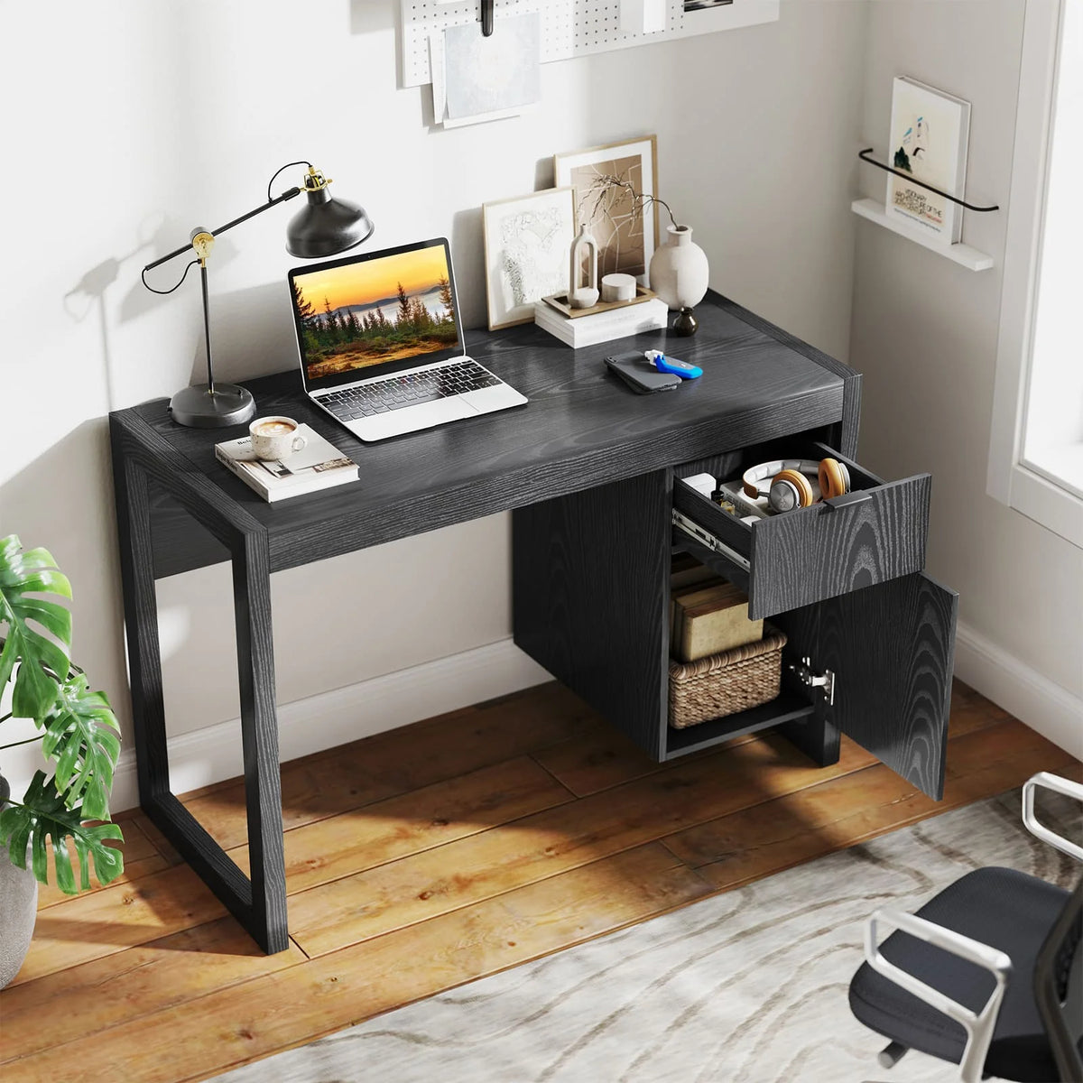 Black wooden computer desk with side drawer cabinet and pull-out storage compartment