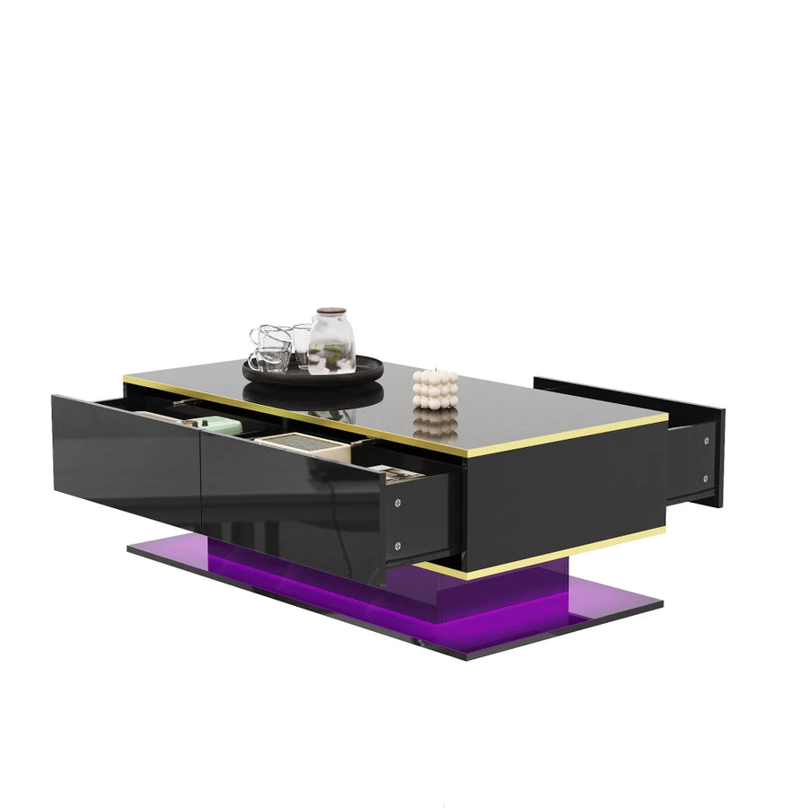 Black coffee table with gold edging, open storage drawer, and purple LED base light