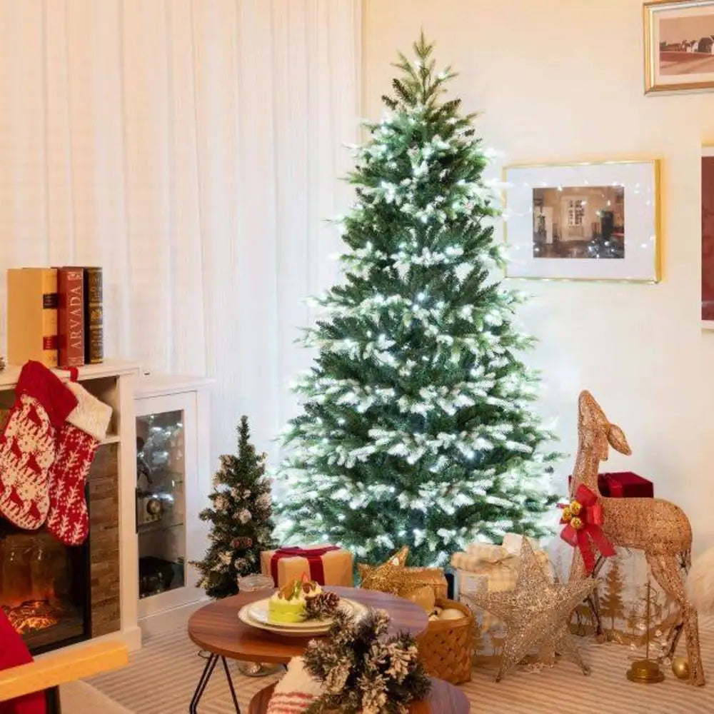 Artificial hinged Christmas tree with full green branches and 180 cm height