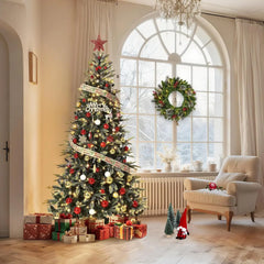 Prelit pencil Christmas tree with warm white lights and red gold ornaments, star topper