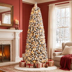 Pre-lit slim artificial Christmas tree with snow-flocked PVC tips and warm white lights.