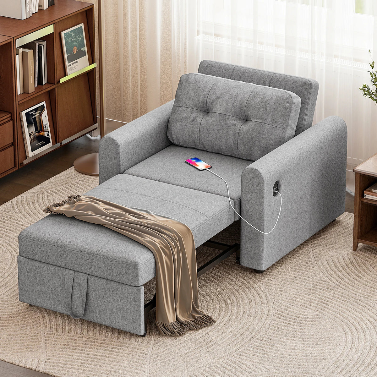 Dark grey single sofa bed chair with tufted back and pull-out seat for sleeping