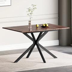 Rectangular extendable dining table with dark wood-look top and black cross legs.