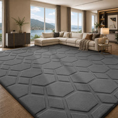Dark gray geometric area rug with embossed hexagon pattern, low-pile textured design