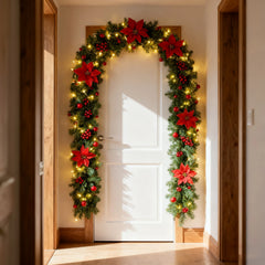 Red LED rattan garland wreath with green foliage, poinsettias, red berries, warm lights