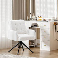 White boucle tub swivel accent chair angled view with padded seat and black metal legs