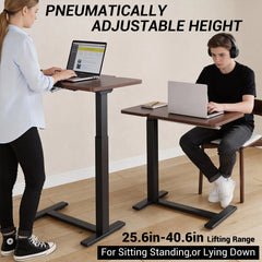 Pneumatically height-adjustable standing desk with tilting desktop and black base