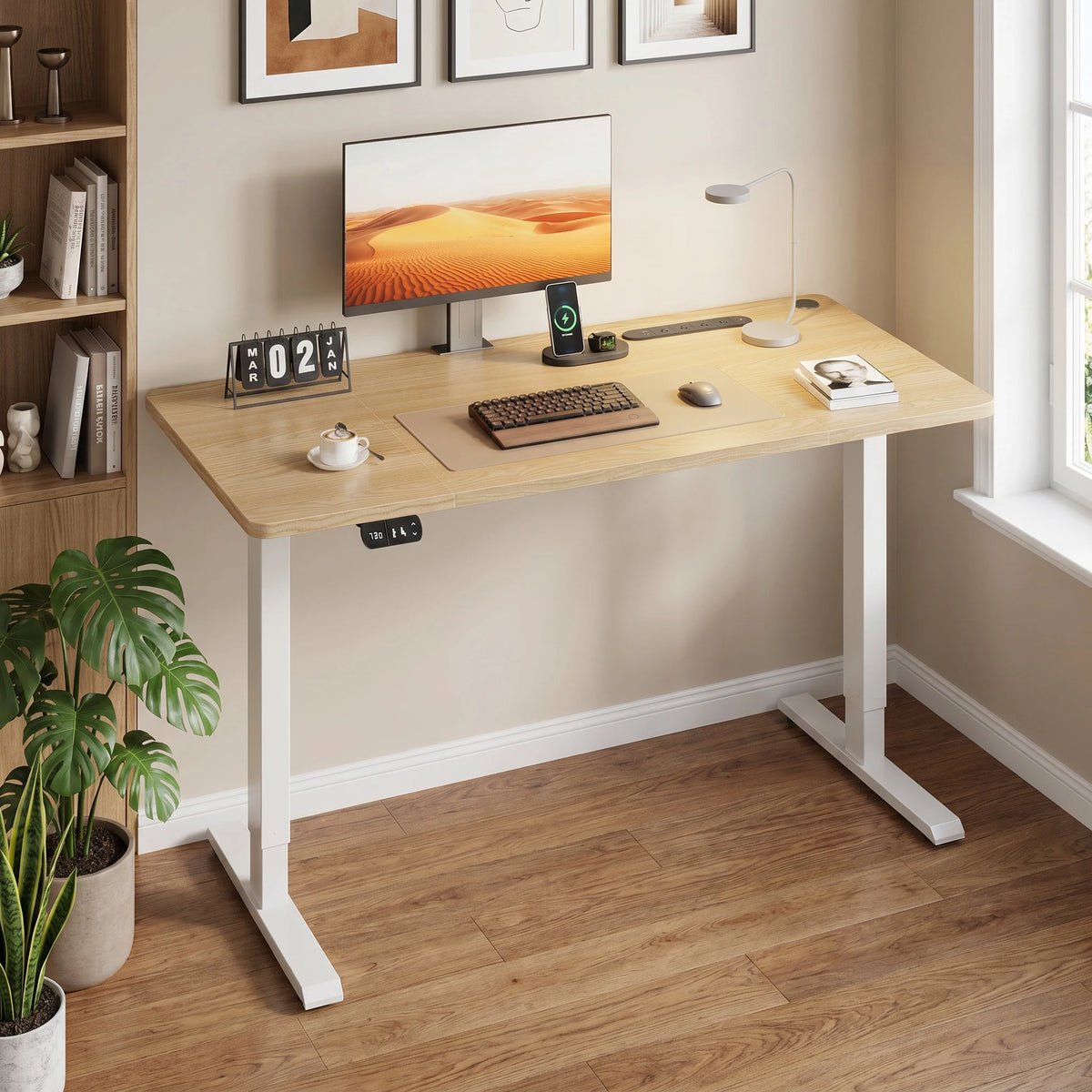 Height-adjustable desk with light wood tabletop, white legs, and integrated control panel