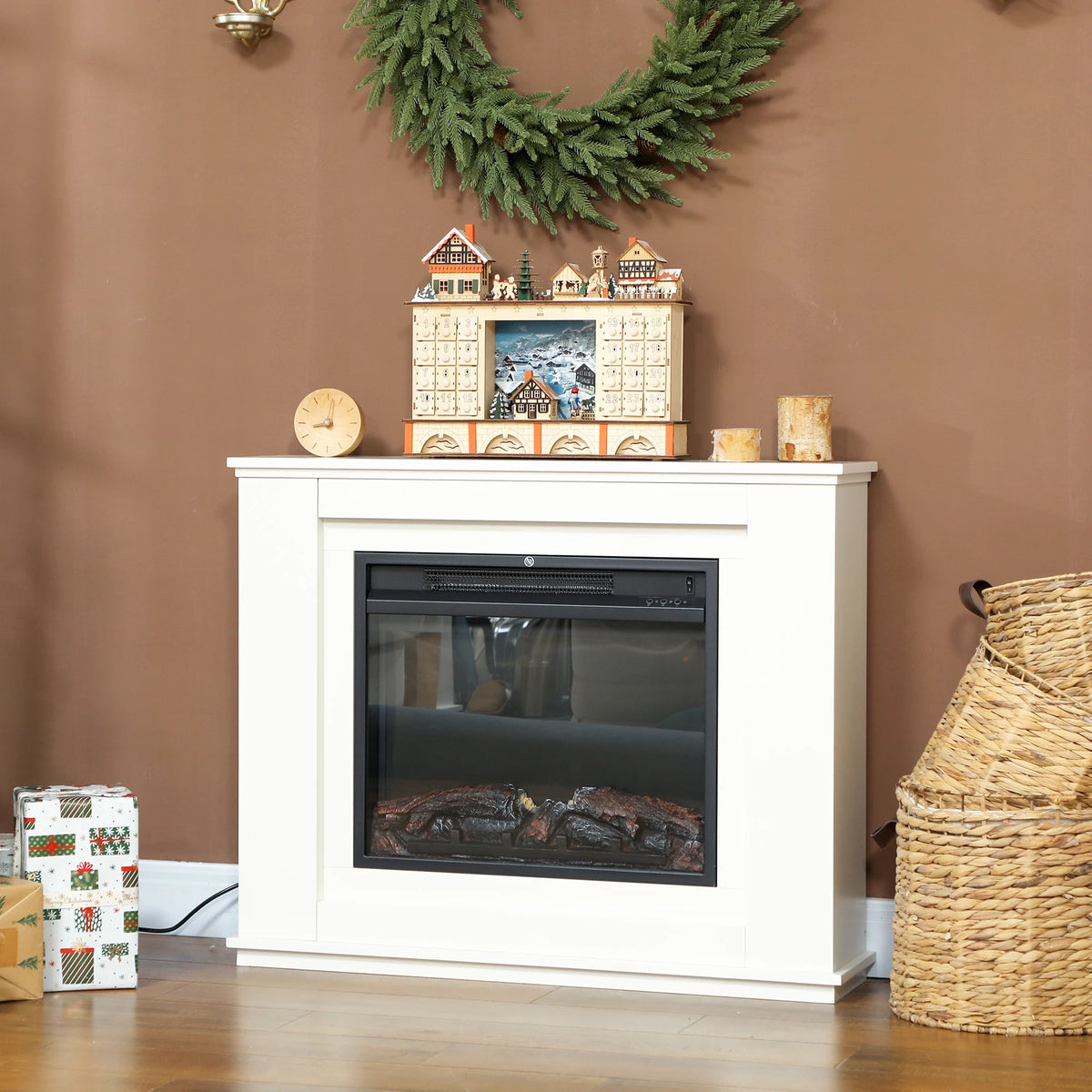 White electric fireplace mantel with glass front and orange flame effect