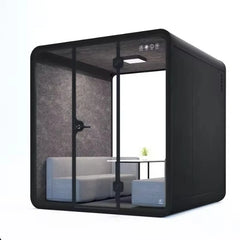 Portable quiet work pod in black with window panels and interior seating, open doorway view