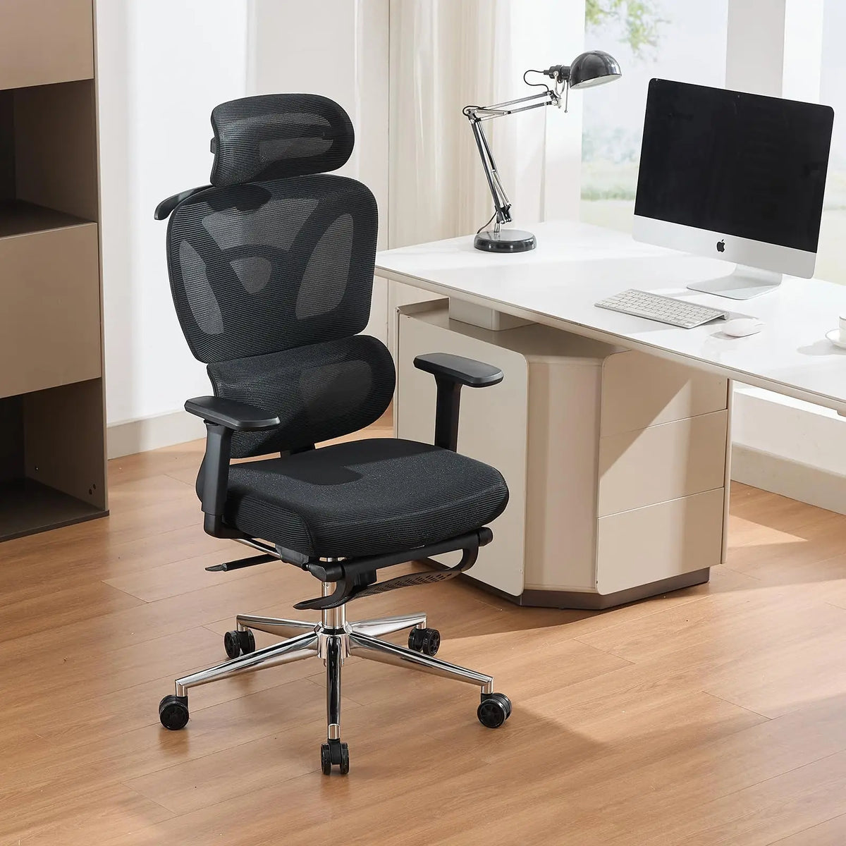 Black mesh ergonomic office chair with headrest, lumbar support, and 3D armrests