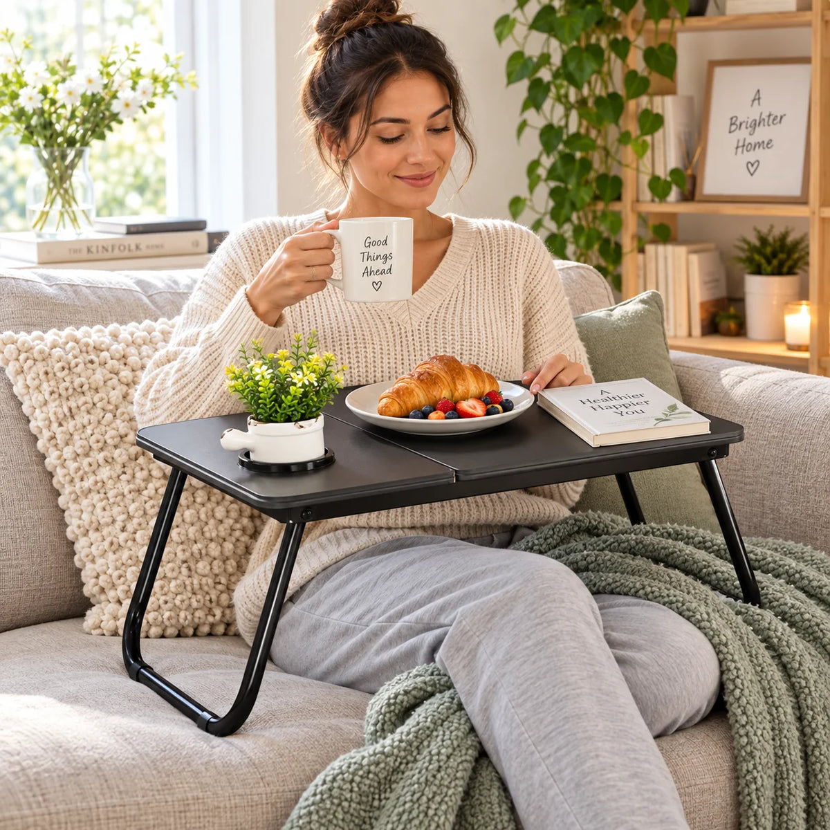 Folding lap desk, black tabletop with side lip and curved support legs