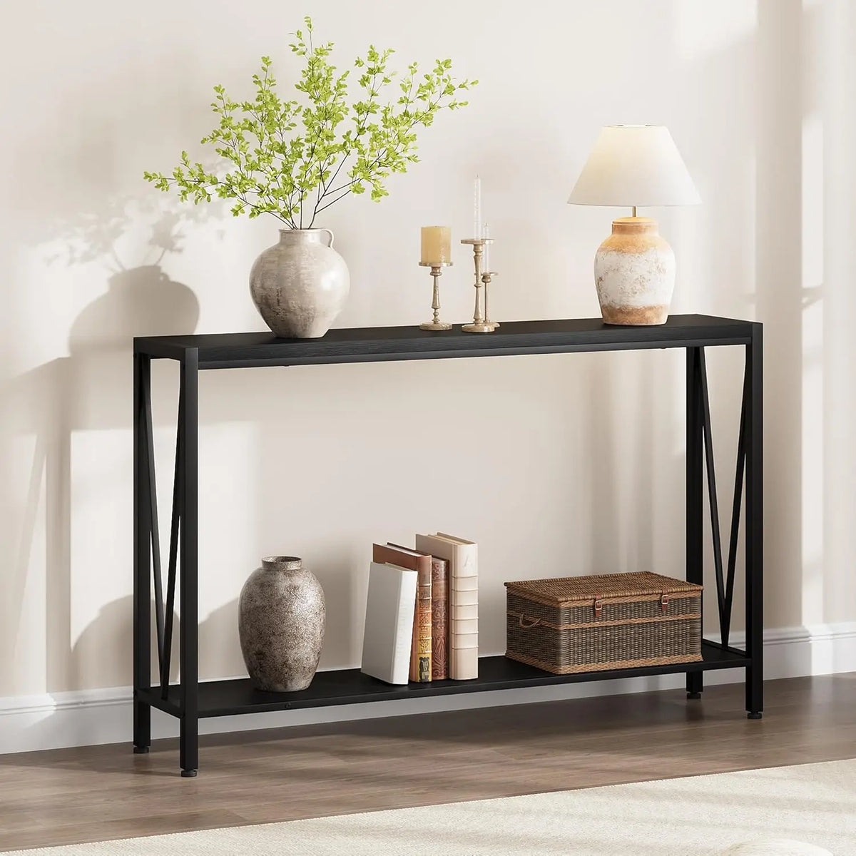 2-tier console table with dark wood top, open lower shelf, and black V-frame legs.