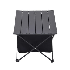 Black folding camping table with hinged slatted top and storage bin
