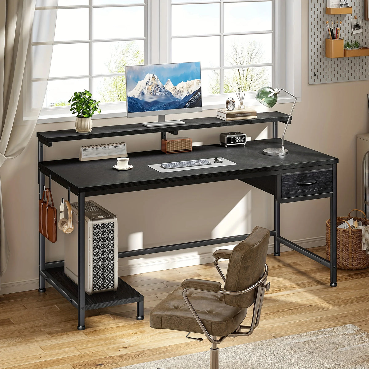 Compact computer desk with dark tabletop, side drawer, and two-level storage