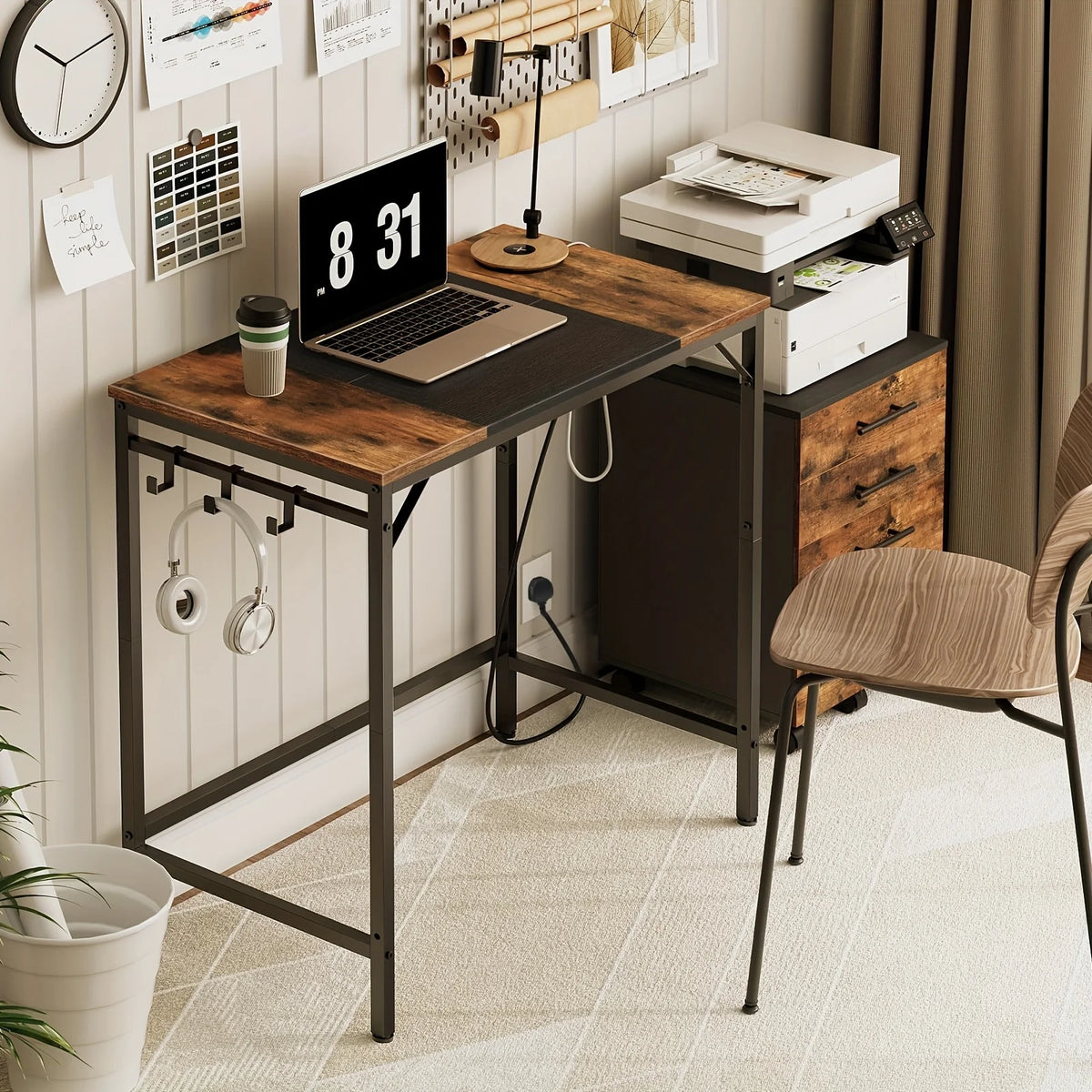 Office desk with brown wood-look top, built-in hooks, and side power strip for charging