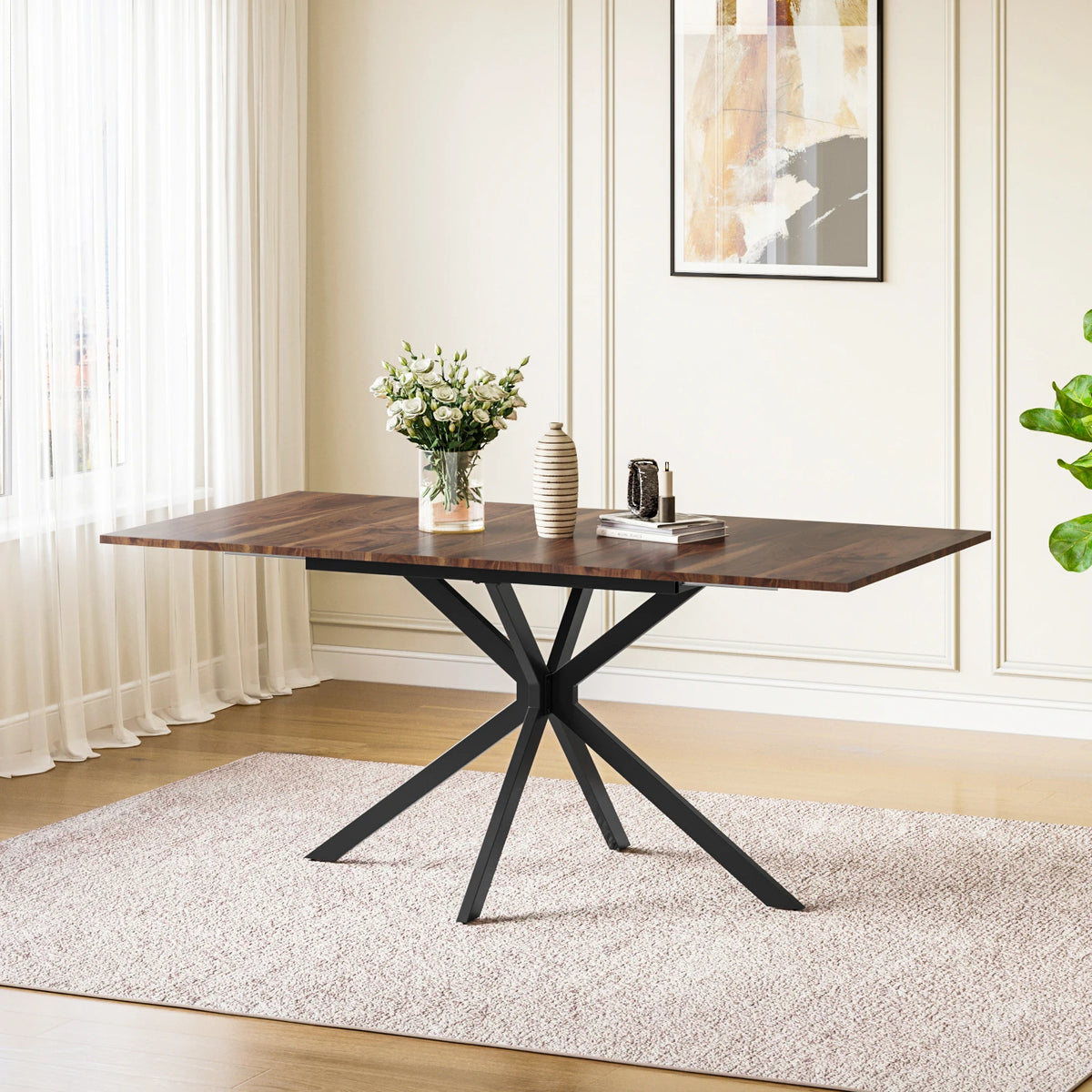 Rectangular extendable dining table with brown wood-grain top and black X legs.