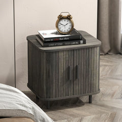 Grey bedside table with roller shutter sliding door and sturdy metal legs