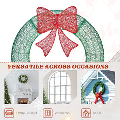 Green lighted metal wreath with red bow, decorative indoor use