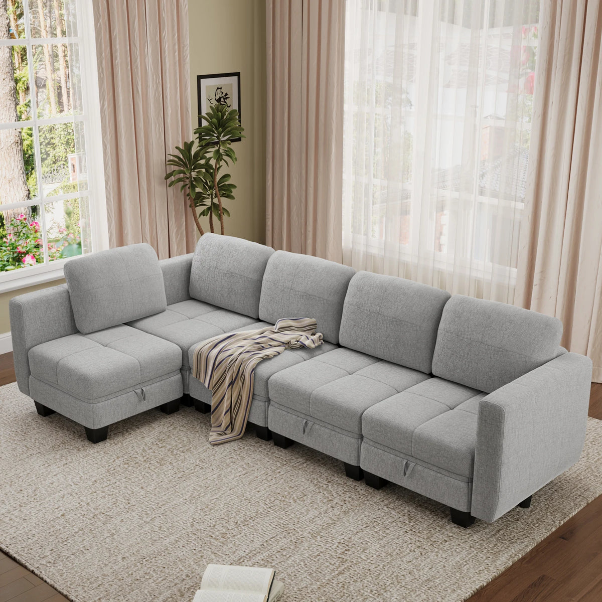 Grey modular sectional sofa with chaise seating and removable cushion covers