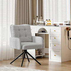 Grey boucle tub swivel accent chair with thick padded seat and back, black metal legs