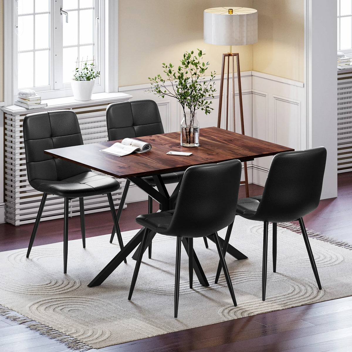 Rectangular extendable dining table with dark wood top and 4 upholstered black dining chairs