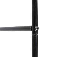 Black metal trellis arch connector joint at round steel tube intersection