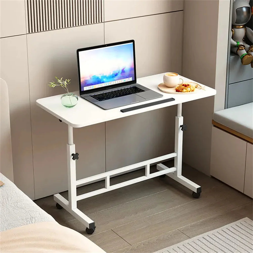 White height-adjustable rolling laptop desk with lower shelf and four caster wheels