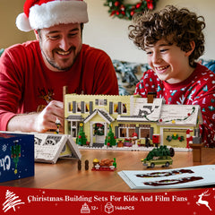 Family playing with lighted Christmas village house building blocks on a table